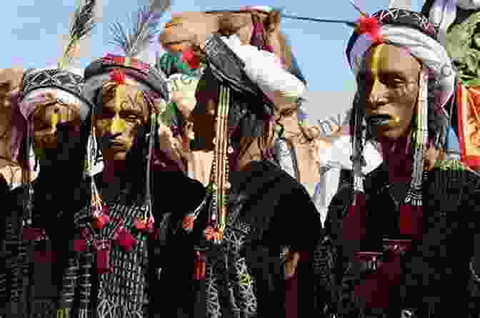 A Group Of People In Traditional Saharan Clothing Sahara Michael Palin