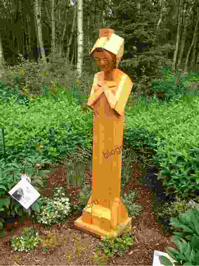A Statue Of Leia Stone In The Alaskan Wilderness, Commemorating Her Life And Story. Wolf Girl Leia Stone